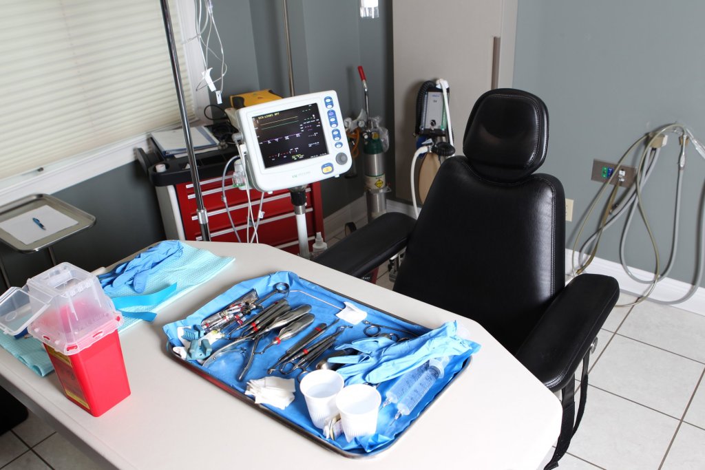 Oral surgery equipment prepared in patient room