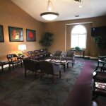 Inside, waiting room at {PRACTICE_NAME}