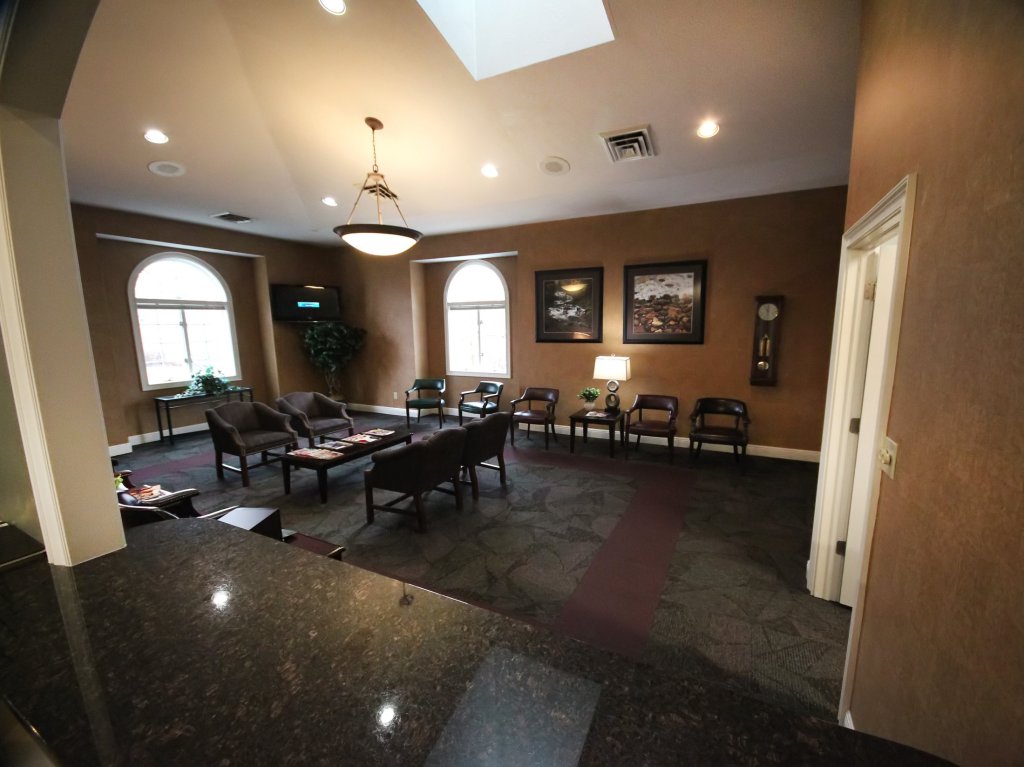 Inside, waiting room at {PRACTICE_NAME}