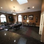 Inside, waiting room at {PRACTICE_NAME}